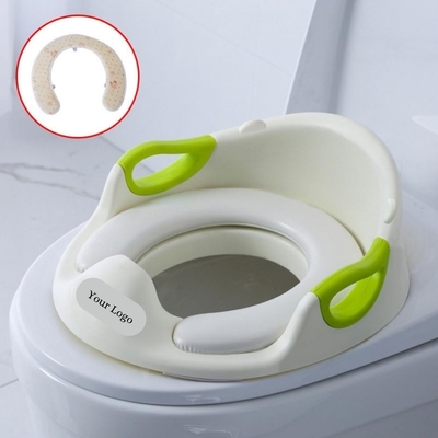 Splashproof kindertrainingstoiletstoel met handgrepen en solide patroon