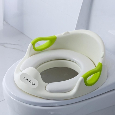 Splashproof kindertrainingstoiletstoel met handgrepen en solide patroon