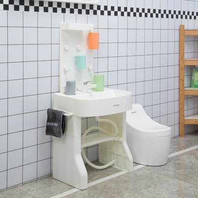 Kleinschalig plastic wasbek met vrij staand voetstuk